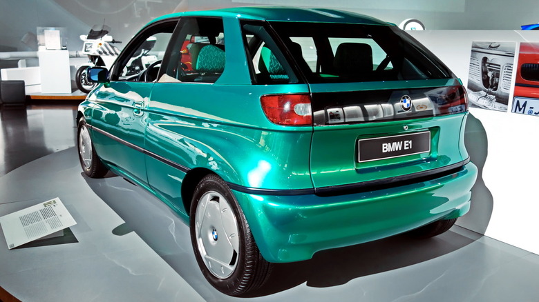 BMW E1 concept car seen from rear left on display indoors