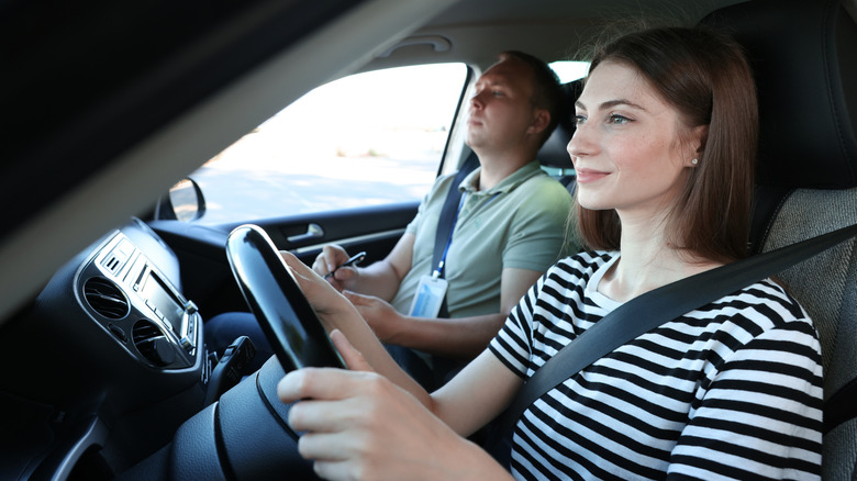 driving student and instructor in a car