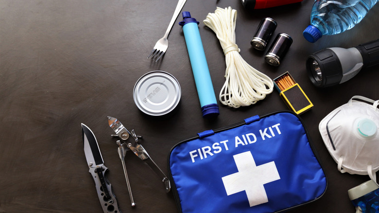 A survival kit of various items.