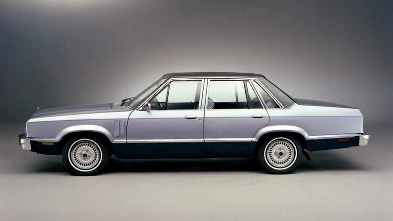 Two-tone blue 1979 Mercury Zephyr sedan seen from left in a studio