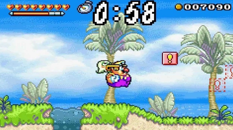 Wario jumping over a gap in Wario Land 4