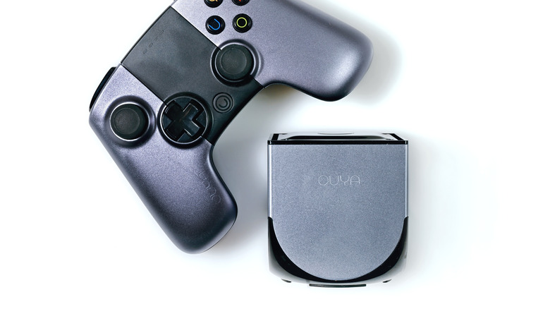 Ouya game console white background
