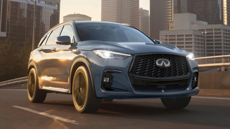 A light blue Infiniti QX50 on a drive