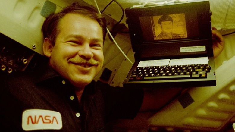 NASA astronaut with GRiD portable computer
