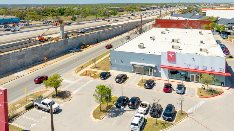 An aerial view of a Tesla dealership