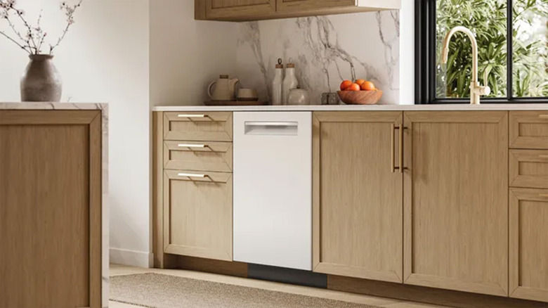 A Bosch dishwasher in a wood panel kitchen