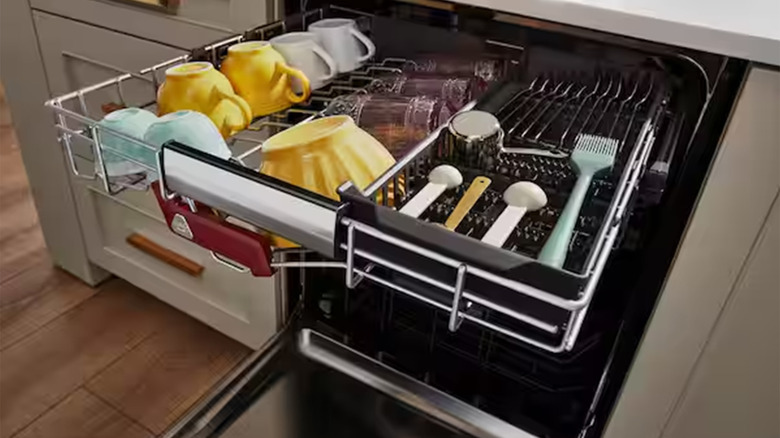The top rack of a KitchenAid dishwasher
