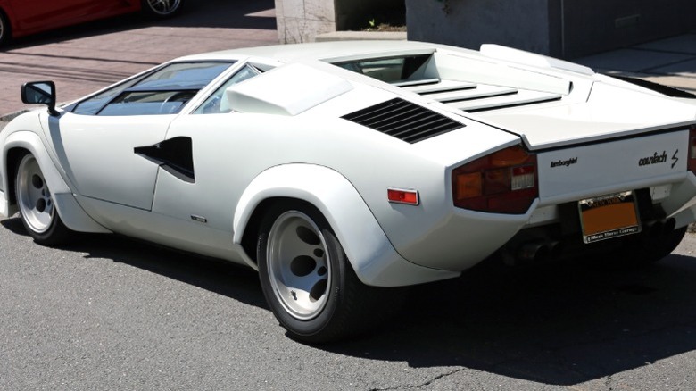 White Lamborghini Countach LP 400S parked at roadside