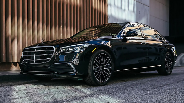 A black Mercedes-Benz S-Class parked