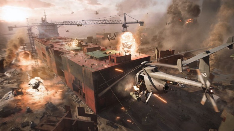 A helicopter attacking a building
