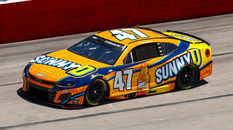 Ricky Stenhouse Jr's racecar, #47 with orange and blue Sunny D branding