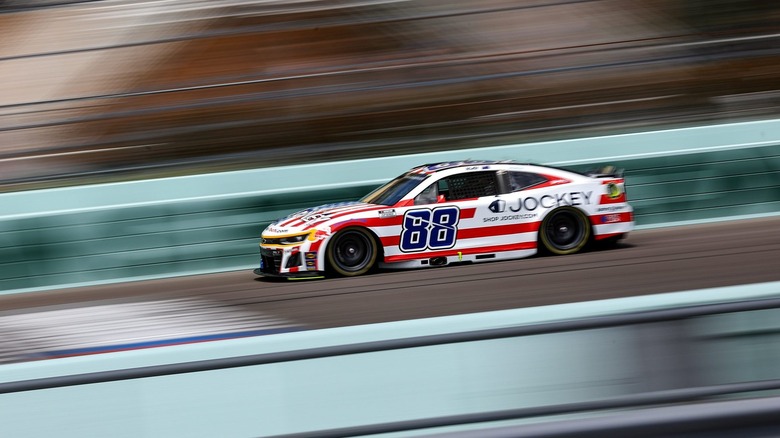 Shane Van Gisbergen's racecar, #88 with red, white, and blue Jockey branding