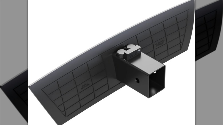 An UNGODLY DESIGN magnetic hitch cover for the Tesla Model Y