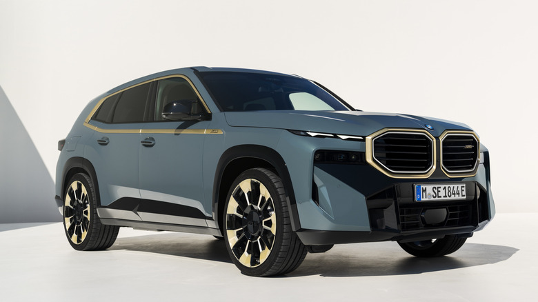 Blue BMW XM studio photo