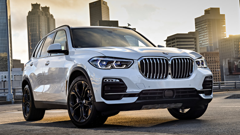 White BMW X5 parked in the city