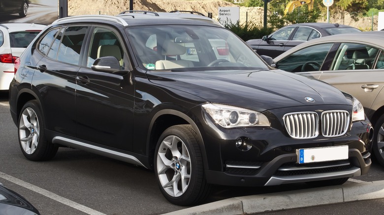 Black BMW X1 parked in a parking lot