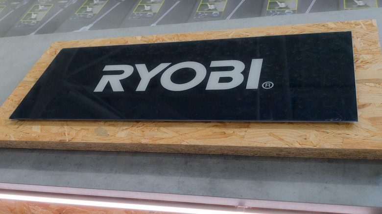 ryobi logo in black and white on a piece of wood
