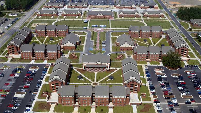 An aerial view of several barracks buildings at Fort Liberty