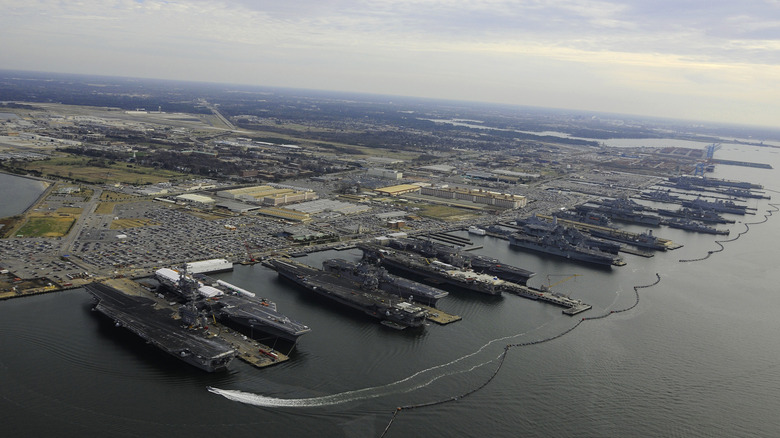 An aerial view of NS Norfolk from the ocean looking in