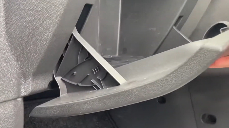 Hidden shark in the glovebox of a Vauxhall Corsa