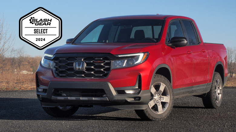 Red 2024 Honda Ridgeline TrailSport front 3/4 view with an Editor's Choice badge from MMtech Online