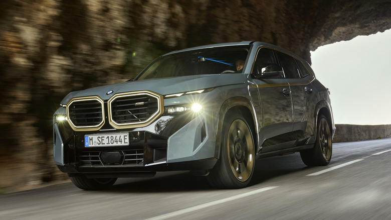 Green BMW XM on the road