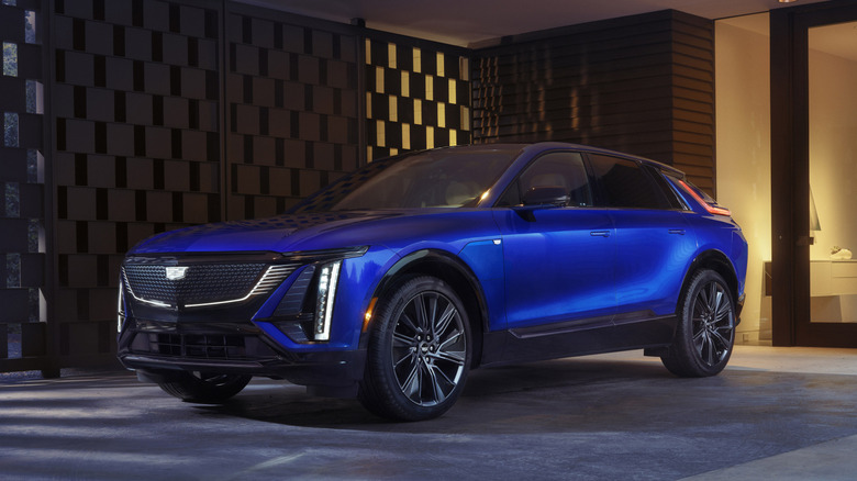 Blue Cadillac Lyriq parked in a driveway