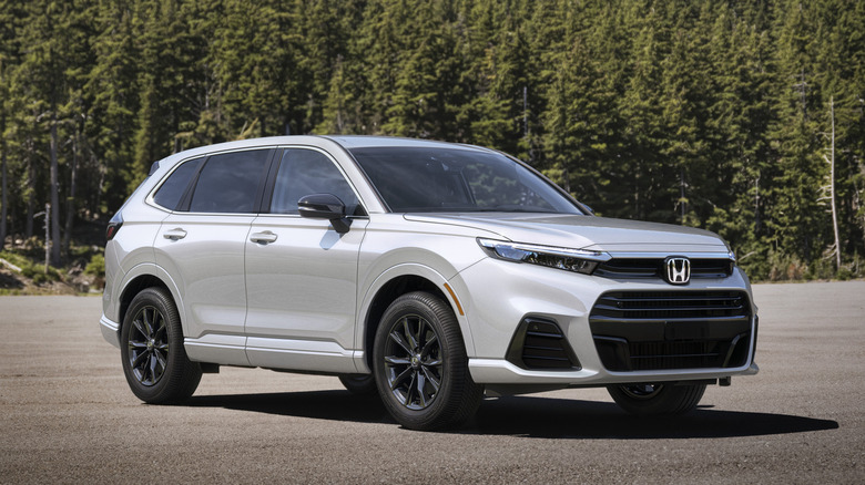 White Honda CR-V e:FCEV parked on asphalt