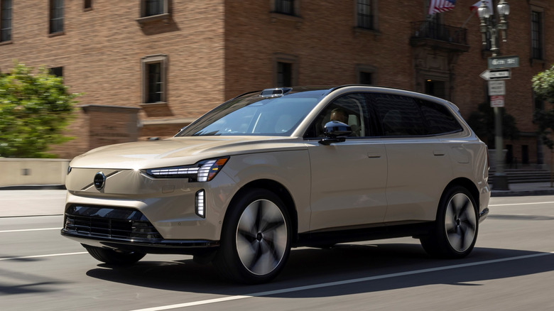 Brown Volvo EX90 on the road