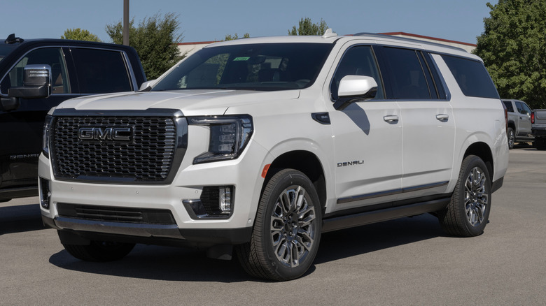 One of the latest GMC Yukon Denali Ultimate XL versions on display in a dealer lot.