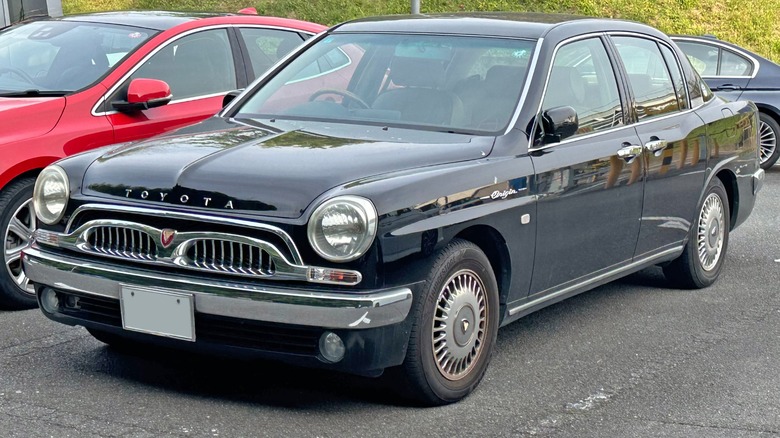 Black Toyota Origin in a parking lot