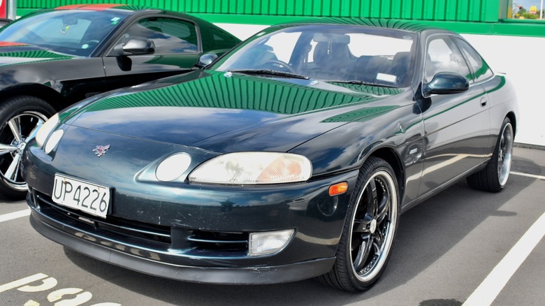 Dark green Toyota Soarer in a parking lot
