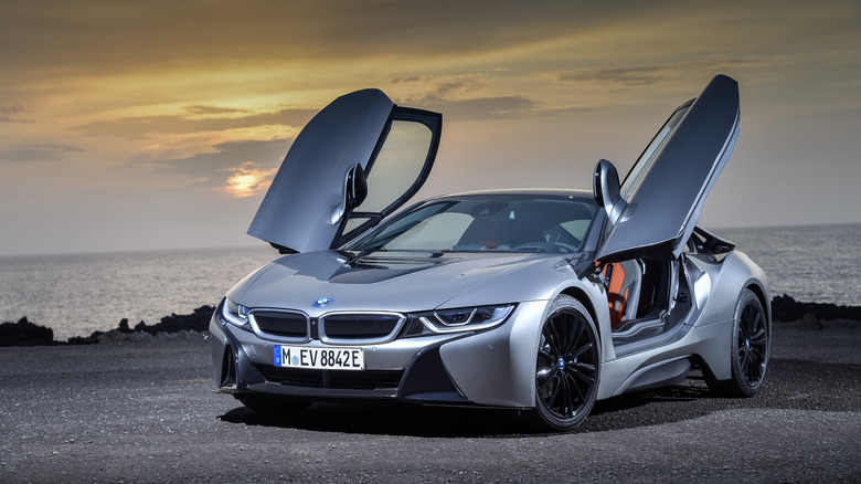 BMW i8 with its butterfly doors opened front 3/4 view