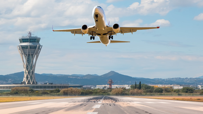 Passenger airplane taking off runway