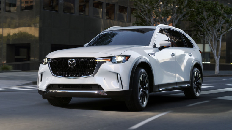 2025 Mazda CX-90 front 3/4 view while cornering