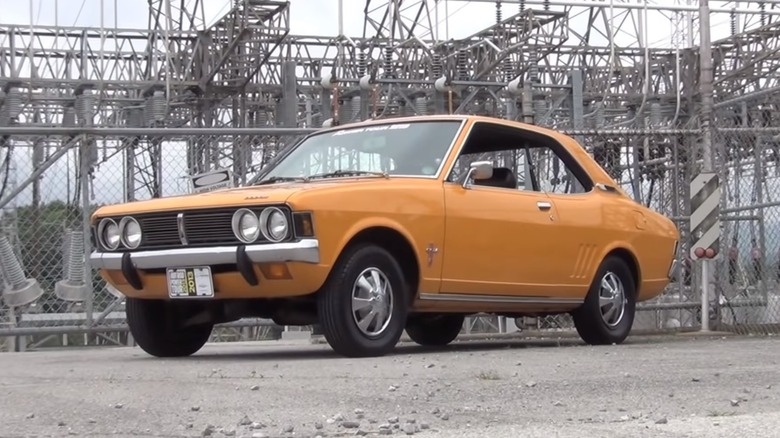 Dodge Colt by a substation