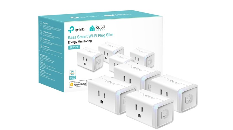 Set of four white plugs in front of product pacakging