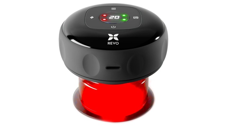Round black and red device featuring Revo branding