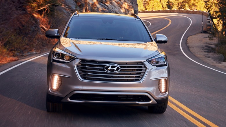 Silver 2017 Hyundai Santa Fe on the road
