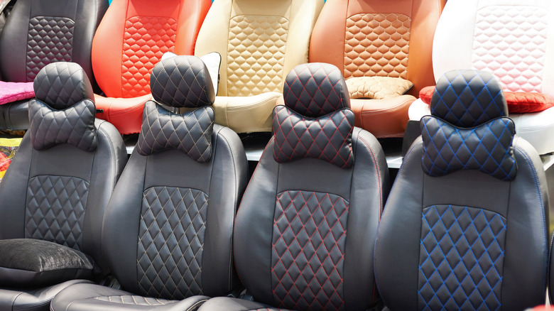 A range of car seat covers in different styles on display for purchase