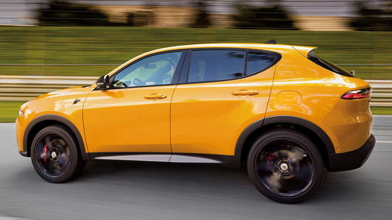 Yellow 2025 Dodge Hornet profile view promotional image