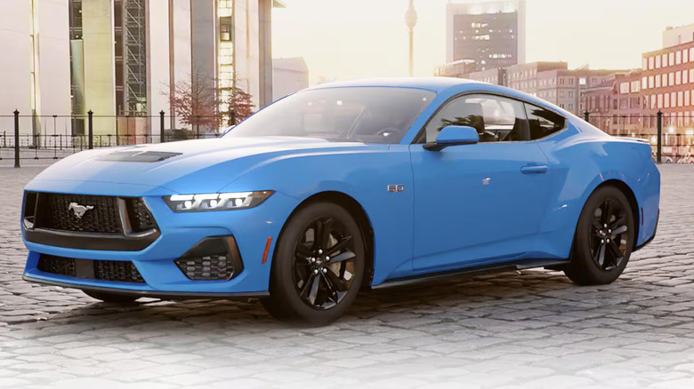 Blue 2025 Ford Mustang on cobbled street promotional image