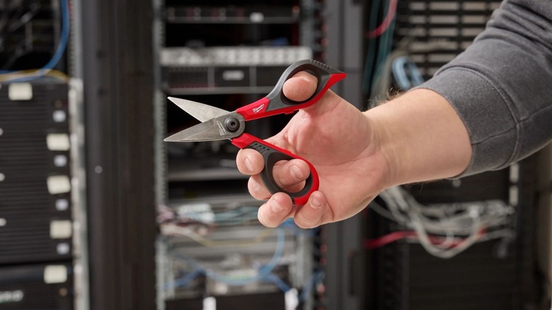 Man holding Milwaukee Kevlar Shears
