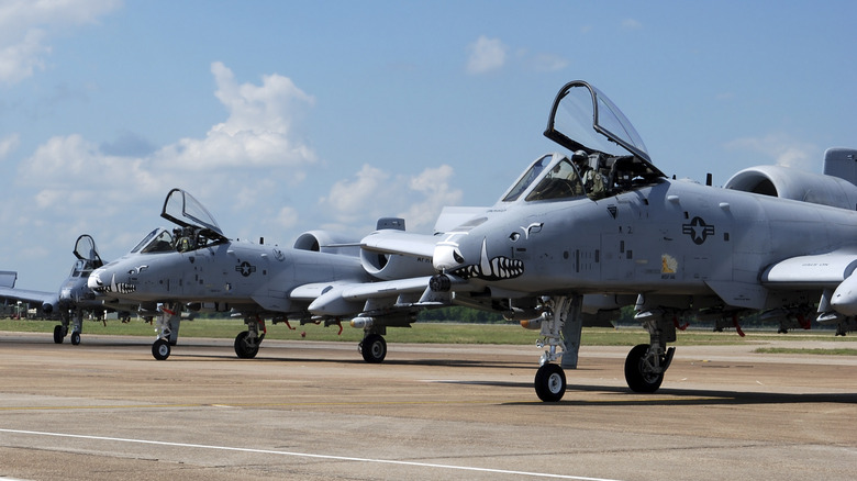 A-10 Thunderbolt aircraft flying at sunset