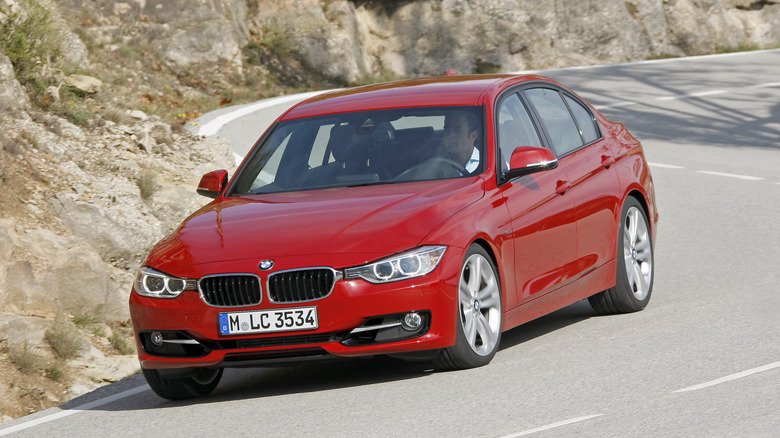 2012 BMW 328i dynamic image front 3/4 view