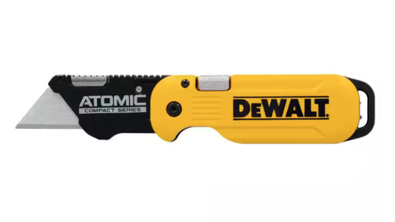 Atomic Folding Utility Knife on display
