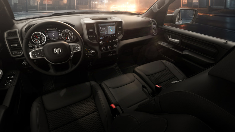 Interior view of a 2025 Ram 1500 Warlock with a bench seat.