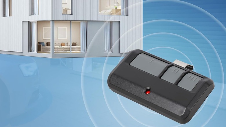 A garage door opener pushing out a signal to a house.