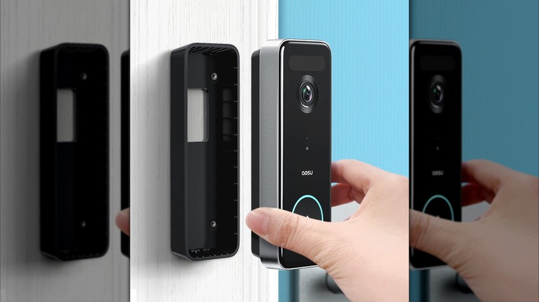 hands installing AOSU doorbell