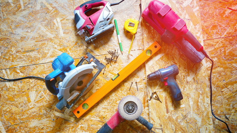 tools sitting on an OSB sheet